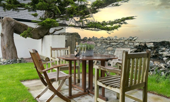 Caergeiliog Cottage | The Gun Room - an on the beach that sleeps 4 guests in 2 bedrooms