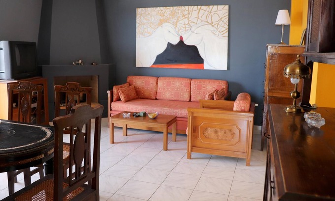 Saronida Apartment | The holiday apartment is in a beautiful and quiet hillside location close to the