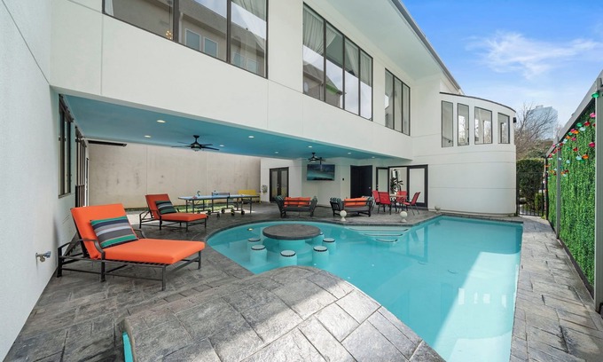 Greenway Plaza-Upper Kirby House | The Kirby Retreat–Luxe Stay w/Heated Pool, King Size Beds, Garage & Games