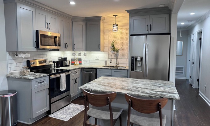 Charlotte House | The Queen City Hideaway. Pet friendly + Hottub!