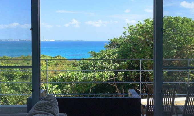 Higashionna House | Theme Suite 101 Overlooking the sea A modern mansion designed by an architect and a photographe/Uruma Okinawa
