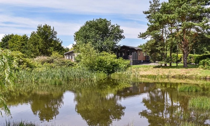 Kirkcudbright House | This 2 bedroom caravan sleeps 4 people in one double and one twin bedroom.