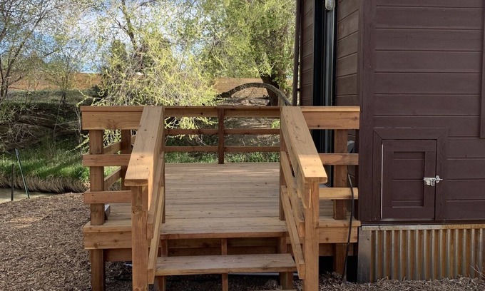 Montrose House | Tiny home located beside a creek.