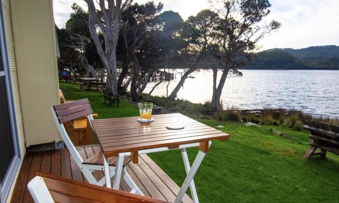 Strahan Cottage | Tiny house perfect couples retreat on the shore of Lettes Bay