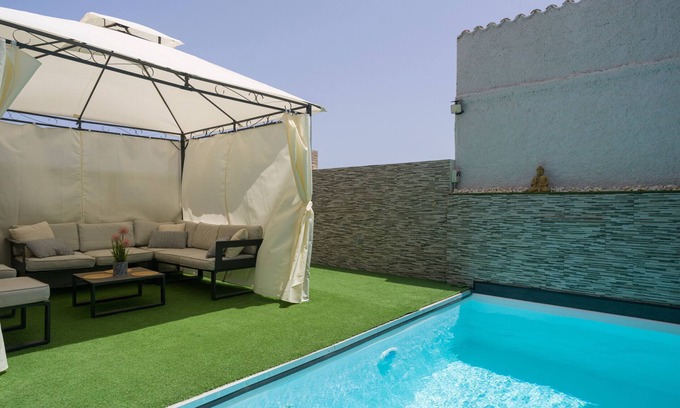 Telde Ski Chalet | Townhouse in Telde with pool and sea views