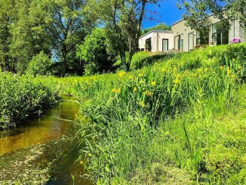 Holstebro Municipality House | Tranquil Riverside Retreat