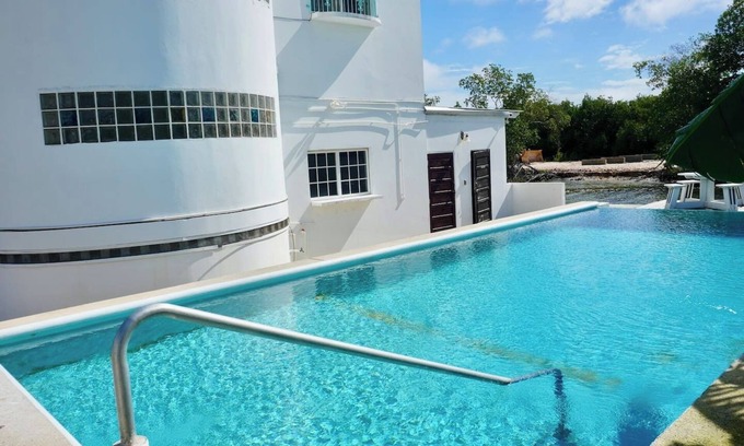 Belize City Apartment | Tranquil SeaView Studio w Pool & Deck near Airport