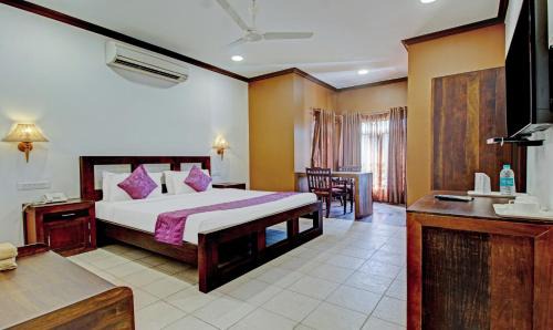 Cherthala Hotel | Treebo Premium Travancore Palace Cherthala