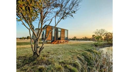 Burrum River House | Turtle Island Lakeside Tiny House 2 by Tiny Away