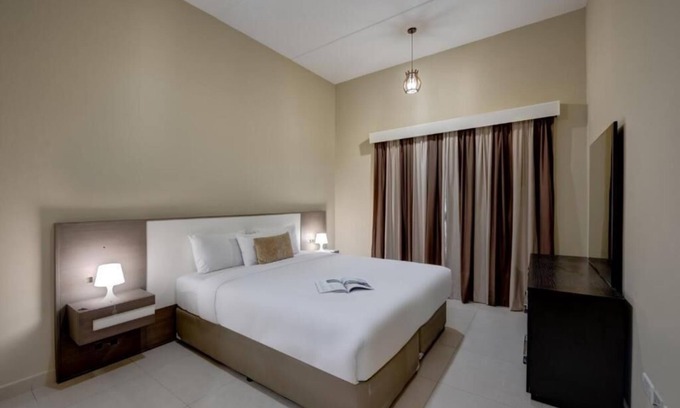 Dubai Investment Park Apartment | Two Bedroom Apartment Near Dunes Village Dip By Luxury Bookings