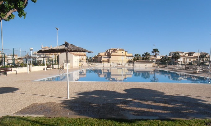 Monte Faro House | Two Bedroom Town House, Communal Swimming Pool, Wi Fi, UK TV and sports court