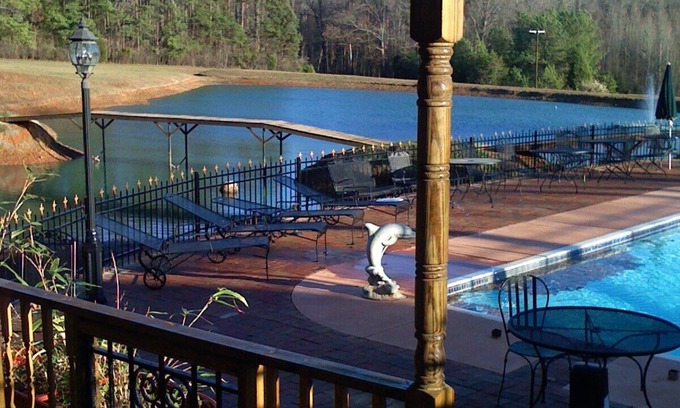 Pittsboro House | Two story cottage on 62 acre Het Landhuis estate