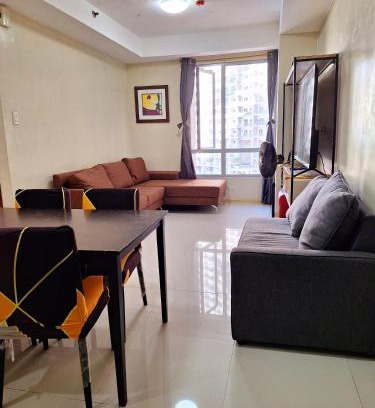 Pasig Apartment | U806 2Bedrooms PoolAccess Netflix wifi85mbps Karaoke