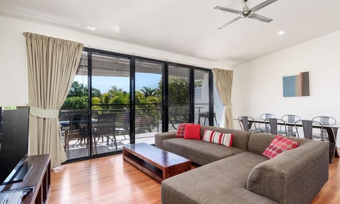 Rainbow Beach Villa | Unit 2 Rainbow Surf - Modern double storey townhouse with large shared pool close to beach and shops
