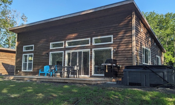 Port Wade Cottage | Unwind at BasinView Retreat: Luxe Waterfront Cottage with hot tub & beach access