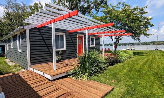 Grant House | Updated cottage with a huge deck, yard, fire pit & pontoon boat in the summer