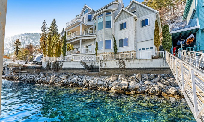Manson House | Upscale lakefront house with stunning views & dock spacious interior with fireplace