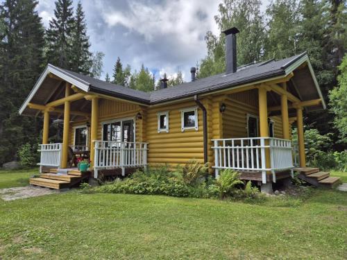 Hiukkajoki Ski Chalet | Välituvan lomamökit