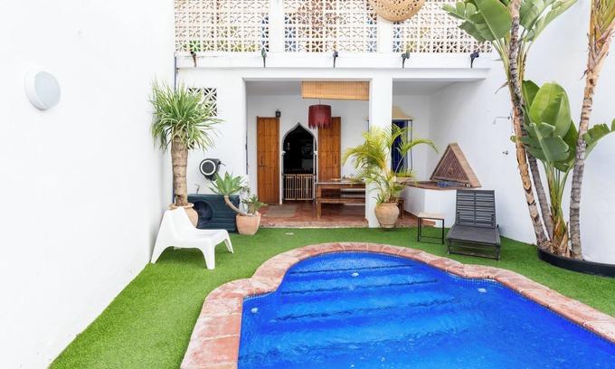 Rio Velez House | Vacation Home 'El Patio Andaluz' with Beautiful Interior, Heated Pool, Wi-Fi & AC