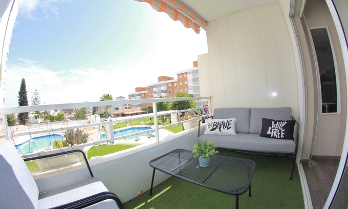 Carihuela Apartment | VERY SUNNY STUDIO WITH POOL, GARDENS, TERRACE AND WIFI.