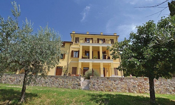 Capodacqua Villa | Villa Ovidia: A three-story age-old farm house surrounded by the greenery, with Free WI-FI.