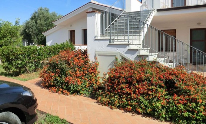 Torre di Bari Apartment | Villa with a large luxury apartment situated at a short walk from Torre di Bari.