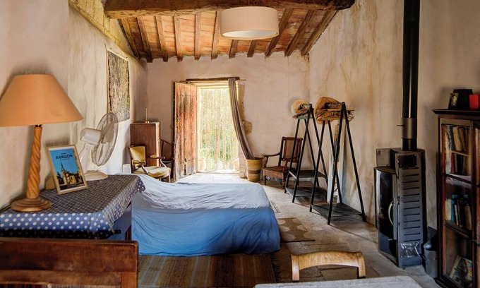 Meynes House | Village house in its original state (under the bell tower)