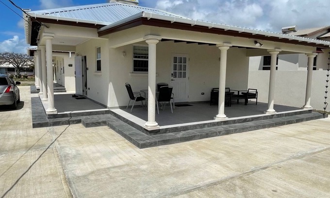 Atlantic Shores Cottage | Walk to Freights Bay surfing & Miami Beach with golfing nearby!