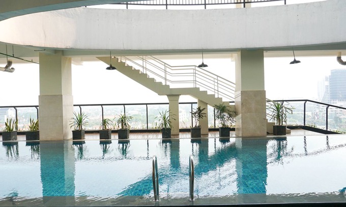 Pondokcina Apartment | Warm and Homey 1BR Apartment at Atlanta Residences By Travelio