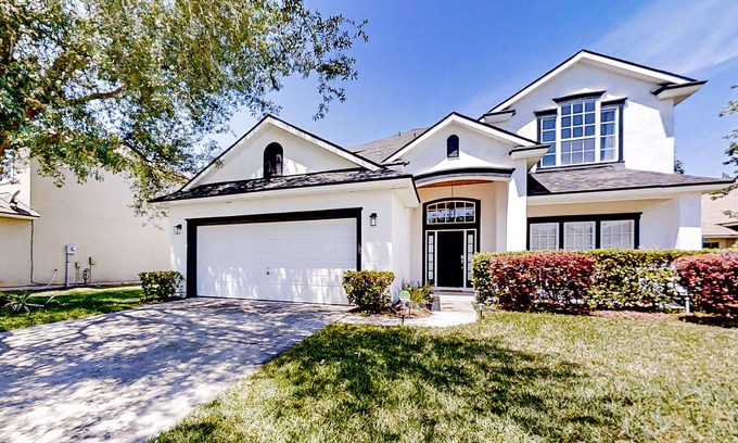 Westside House | Waterfront 2-story home with water views, patio, streaming, washer/dryer, & AC