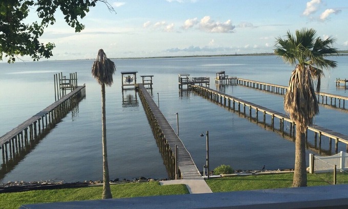 Dickinson House | Waterfront Bay House with Elevator, 350' Lighted Fishing Pier with Boat Lift.