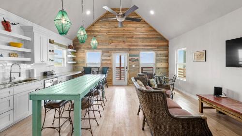 Flour Bluff House | Waterfront Escape w Views Shared Pool Boat Dock Orange Crush by AvantStay