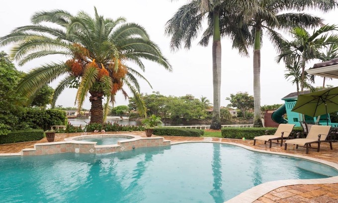 Sunset House | Waterfront Property with a resort style backyard and Heated Pool in Miami