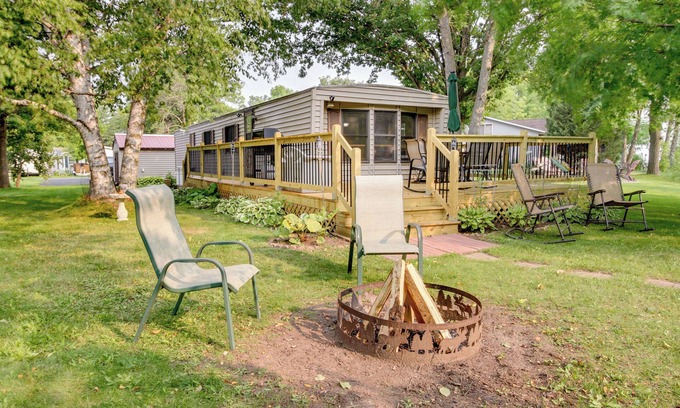 Isle House | Waterfront Wahkon Home w/Wraparound Deck & Docks