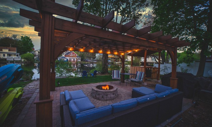 Laconia House | Waterfront with Kayaks, Pool Table, Fire Pit, and Pergola. Downtown area