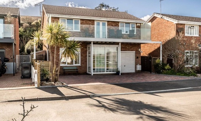Ebford House | Waterside retreat with estuary views and balcony