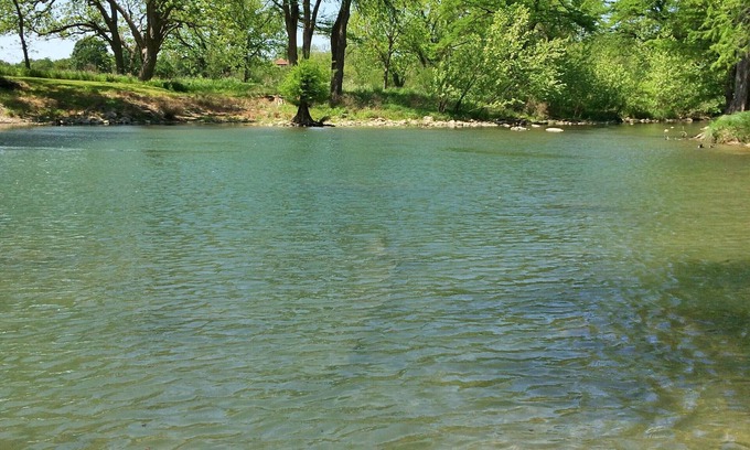 New Braunfels Condo | Waterwheel on the Guadalupe - river access, 2 pools, 4 hot tubs, 5 acres of lawn