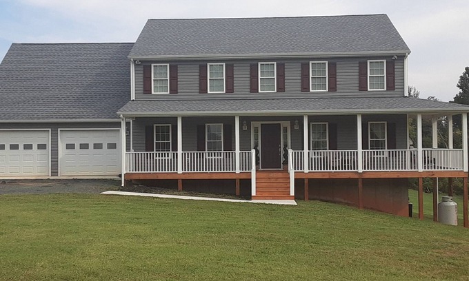 Madison Heights House | Welcome Home! New luxurious home awaits - large family room w/fireplace.