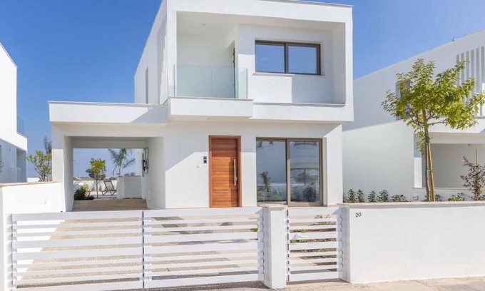 Softades House | Welcome to this stunning, modern villa, which sits within an exclusive gated complex surrounded by f