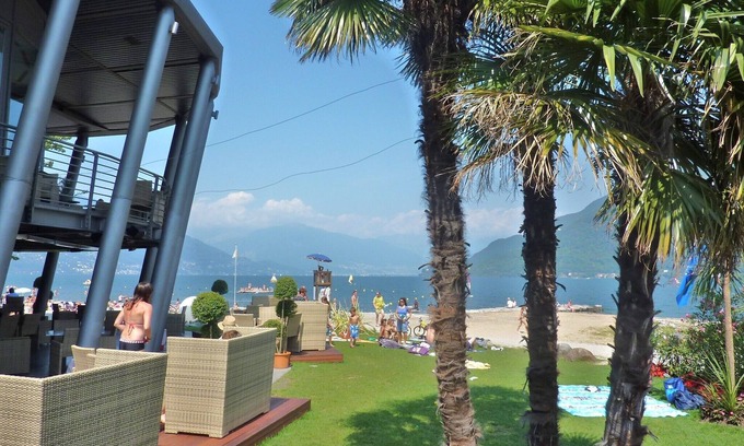 Cannobio Apartment | Well-kept FEWO 2 pers.100 m to the beach with covered private terrace, parking lot