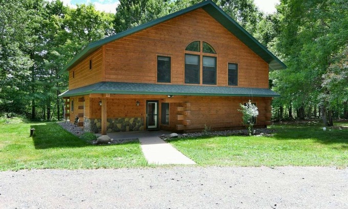 Iron River Cabin | Whispering Waters Lodge with Waterfall, Pond and Trails on Property in Delta, WI
