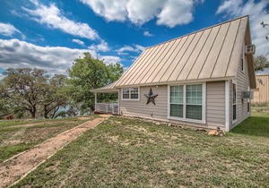 400 feet of private lake front, home and cottage on 3.4 acres, sleeps 16!