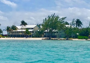 The Retreat at Rum Point Unit #28. Stunning 3BR Oceanfront Penthouse Condo