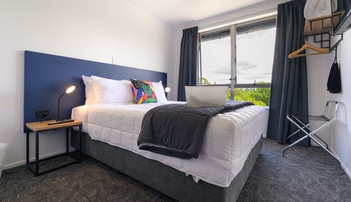 Queen Bed with Shared bathroom