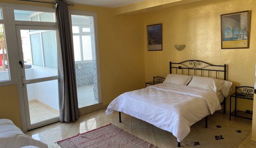 Economy Quadruple Room, City View