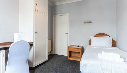 Basic Single Room with Shared Bathroom