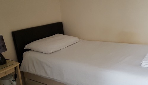 Basic Single Room, Shared Bathroom