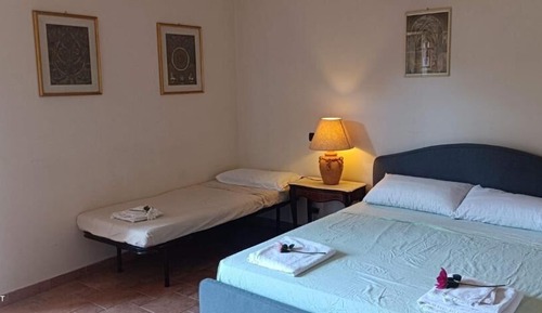 Family Triple Room, Balcony, Garden View