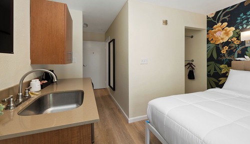 Queen Bed Studio with Patio