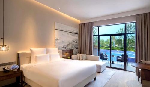 Deluxe King Room with Private Balcony and Pool Access